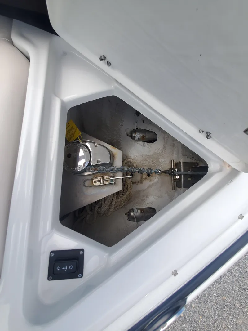 Slide: The Image of Anchor storage compartment of a 2014 Crownline 285 SS boat. - 18
