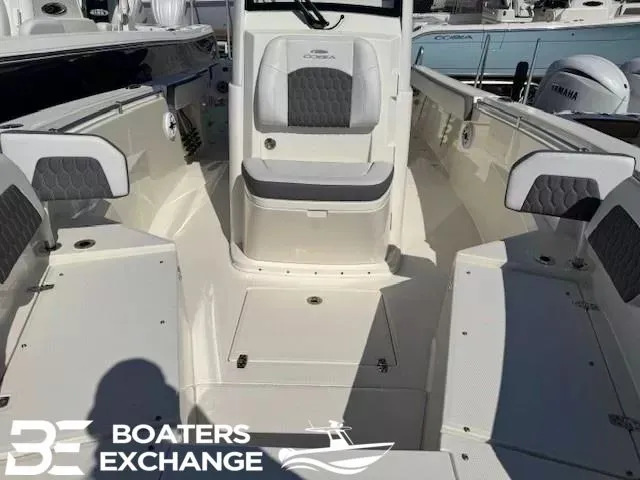 Slide: The Image of Cobia 265 Center Console 2025 with seating area and helm. - 10