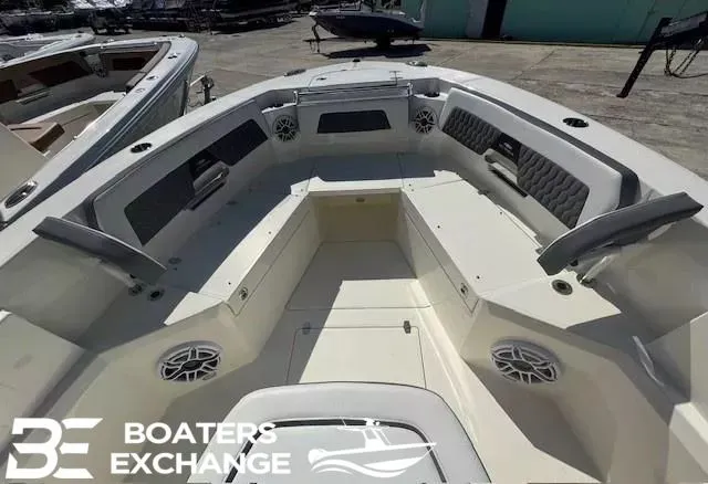 Slide: The Image of 2025 Cobia 265 Center Console with spacious deck and seating. - 9