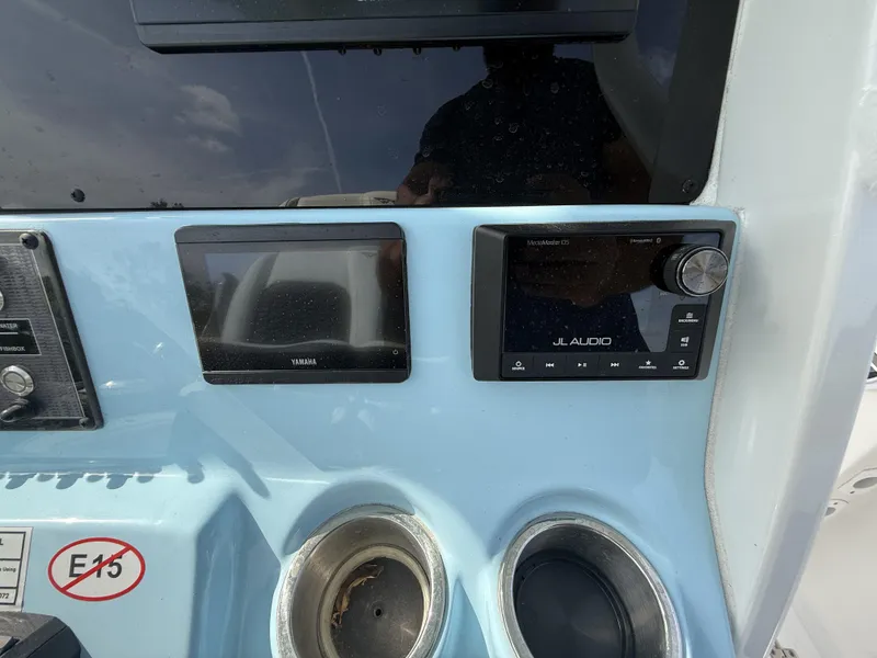 Slide: The Image of Dashboard of 2024 Tidewater 256 CC Adventure with Yamaha and JL Audio systems. - 14
