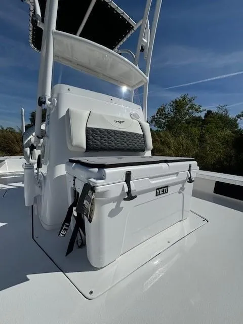Slide: The Image of 2024 Tidewater 23 TPC RAPTOR boat with YETI cooler on deck. - 12
