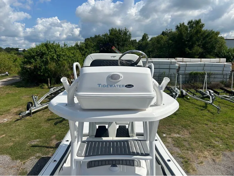 Slide: The Image of 2025 Tidewater 2700 Carolina Bay boat with center console and steering wheel. - 10