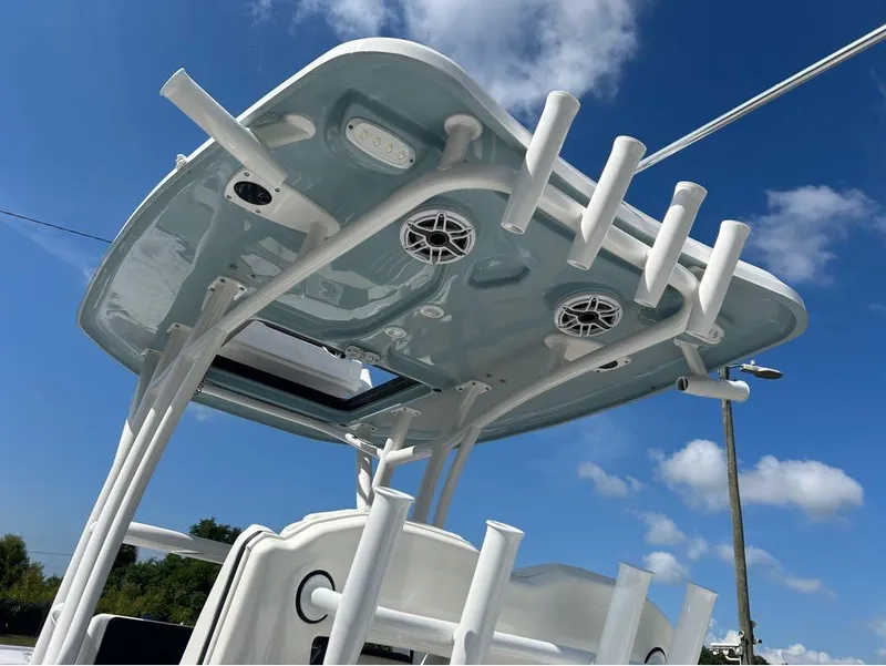 Slide: The Image of Tidewater 2700 Carolina Bay 2025 boat top view with rod holders and speakers. - 13