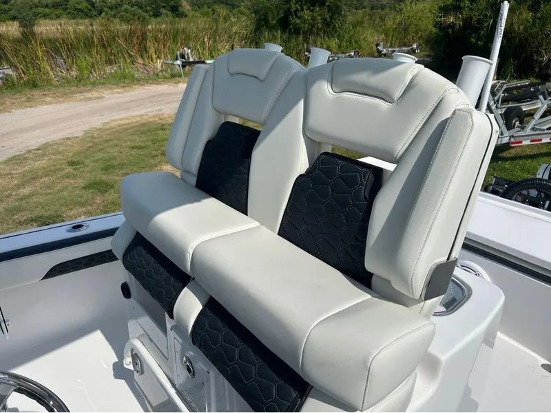 Slide: The Image of 2025 Tidewater 2700 Carolina Bay boat with dual cushioned seats. - 18