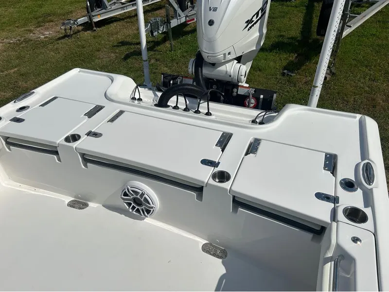 Slide: The Image of 2025 Tidewater 2700 Carolina Bay boat with Yamaha V8 engine, rear deck view. - 4