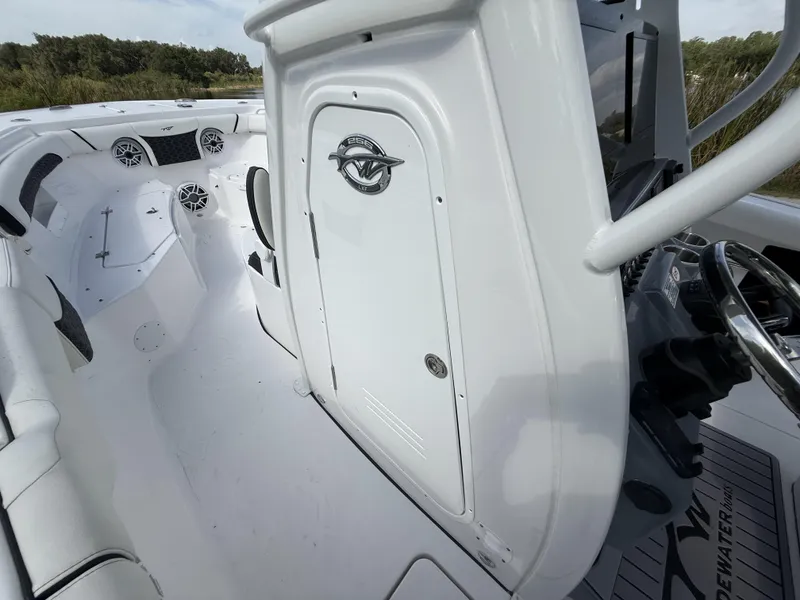 Slide: The Image of 2024 Tidewater 256 LXF boat interior with sleek design and modern features. - 47
