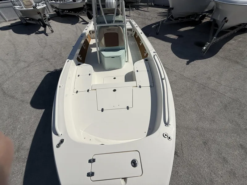 Slide: The Image of 2024 Pathfinder 2600 TRS boat, top view, showcasing spacious deck and seating area. - 13