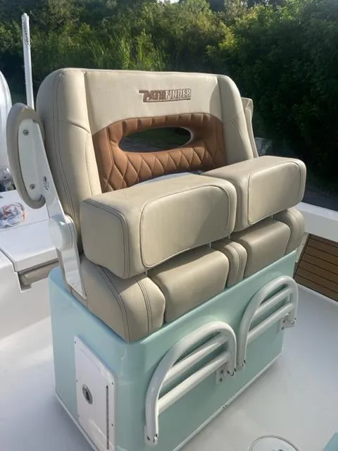 Slide: The Image of 2024 Pathfinder 2600 TRS boat seat with beige and brown cushioned design. - 28