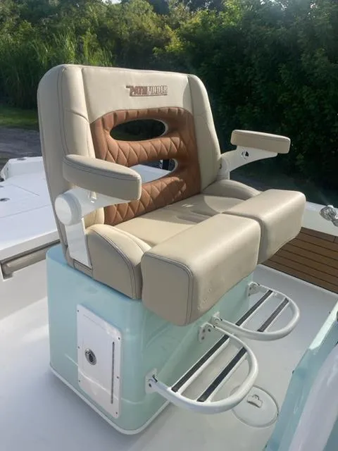 Slide: The Image of 2024 Pathfinder 2600 TRS boat seat with armrests and footrests. - 29