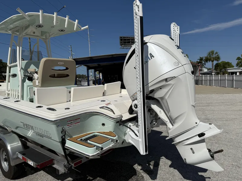 Slide: The Image of 2024 Pathfinder 2600 TRS boat with Yamaha outboard motor on a trailer. - 33