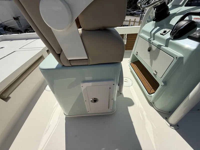 Slide: The Image of 2024 Pathfinder 2600 TRS boat interior with seating and console details. - 46