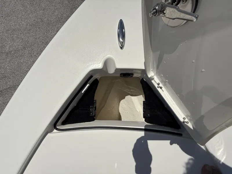 Slide: The Image of Open storage compartment on 2024 Pathfinder 2300 HPS boat deck. - 33
