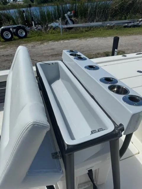 Slide: The Image of 2024 Pathfinder 2300 HPS boat seating and storage compartment. - 41