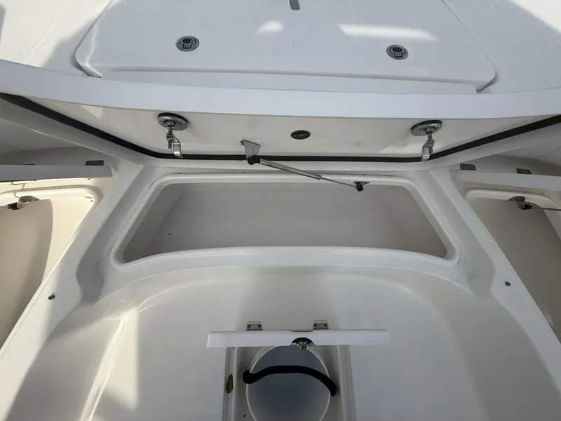 Slide: The Image of 2024 Tidewater 2500 Carolina Bay boat storage compartment, open and spacious design. - 49