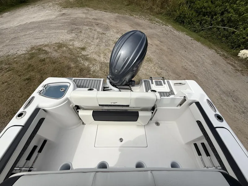 Slide: The Image of 2024 Tidewater 220 CC Adventure boat with outboard motor, viewed from above. - 8
