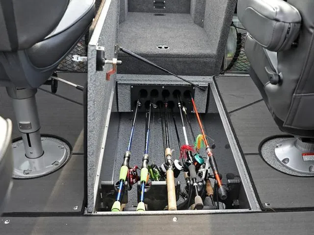 Slide: The Image of Fishing rod storage compartment in 2024 Lund 1975 Tyee Sport boat. - 25