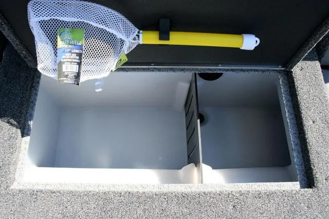 Slide: The Image of 2024 Lund 1875 Crossover XS Sport livewell with a yellow-handled fishing net. - 14