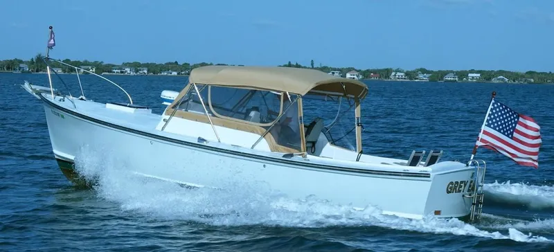 The Image of 1968 Dyer 29 Bass Boat cruising with American flag. - 0