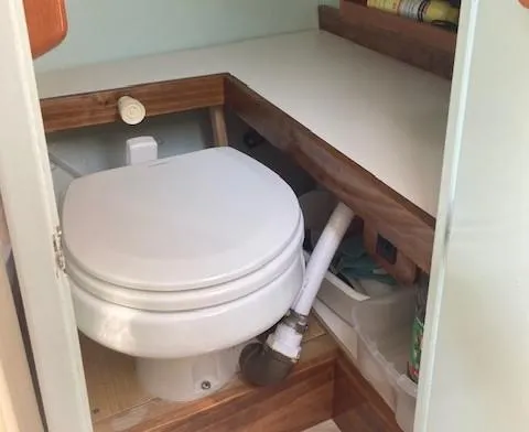 Slide: The Image of Interior of a 1968 Dyer 29 Bass Boat toilet area. - 8