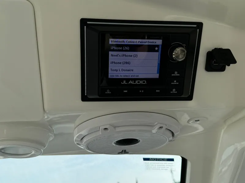 Slide: The Image of JL Audio system on a 2021 Pursuit DC 365 boat with Bluetooth connectivity. - 15