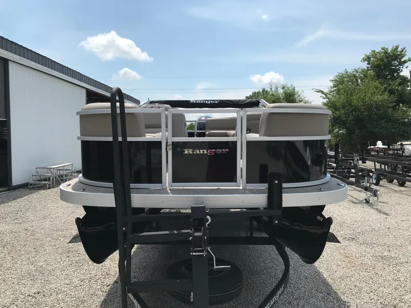 Slide: The Image of 2024 Ranger Reata 200C pontoon boat on a trailer, rear view. - 4