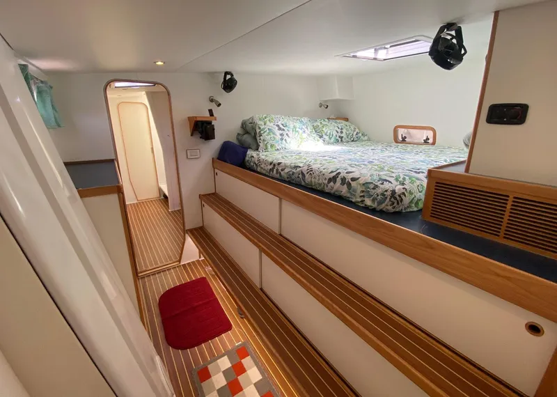 Slide: The Image of Luxurious cabin interior of 2018 Chris White Atlantic 70 "SAPHIRA" with cozy bed and wooden flooring. - 15