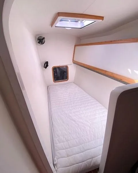 Slide: The Image of Compact cabin interior of 2018 Chris White Atlantic 70 "SAPHIRA" with single bed and porthole. - 17