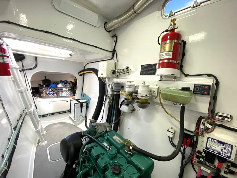 Slide: The Image of Engine room of 2018 Chris White Atlantic 70 "SAPHIRA" with visible equipment and fire extinguisher. - 20