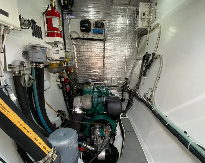 Slide: The Image of Engine room of 2018 Chris White Atlantic 70 "SAPHIRA" with visible machinery and equipment. - 21