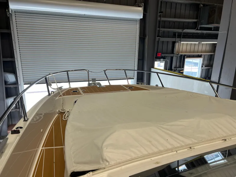 Slide: The Image of 2023 Beneteau Gran Turismo 32 yacht in indoor storage facility. - 18