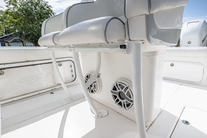 Slide: The Image of 2020 Glasstream 328 Pro-XS boat interior with white seating and speakers. - 21