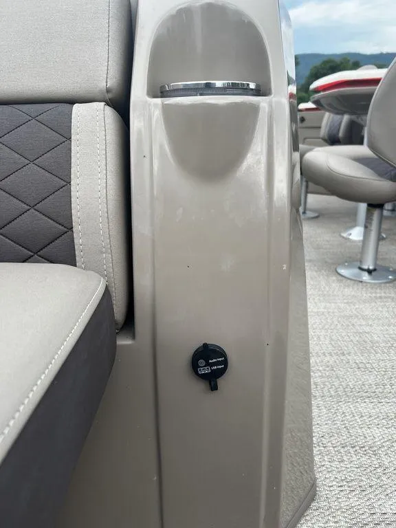 Slide: The Image of 2019 Bennington 25 SPDXP interior seating and USB port. - 6