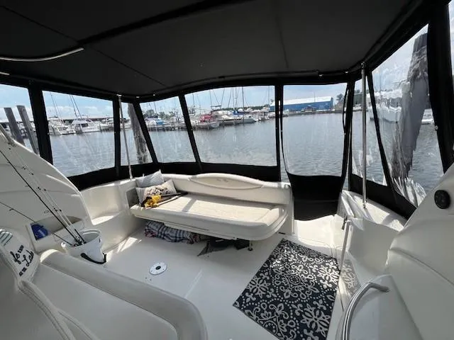 Slide: The Image of Interior view of 2002 Sea Ray 360 Sundancer yacht at marina. - 10