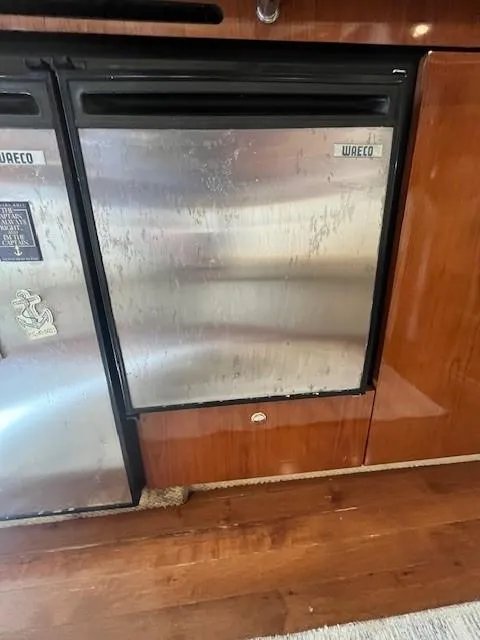 Slide: The Image of Stainless steel refrigerator in 2002 Sea Ray 360 Sundancer yacht kitchen. - 32