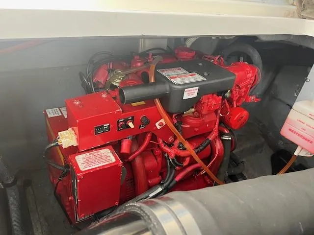 Slide: The Image of Engine compartment of a 2002 Sea Ray 360 Sundancer boat. - 46