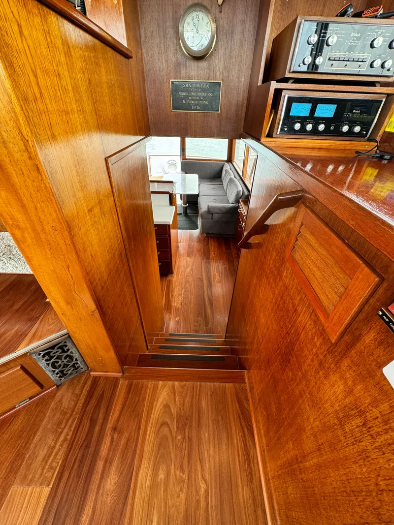 Slide: The Image of Interior of 1976 Nordlund 60 Motoryacht with wooden stairs and vintage equipment. - 26