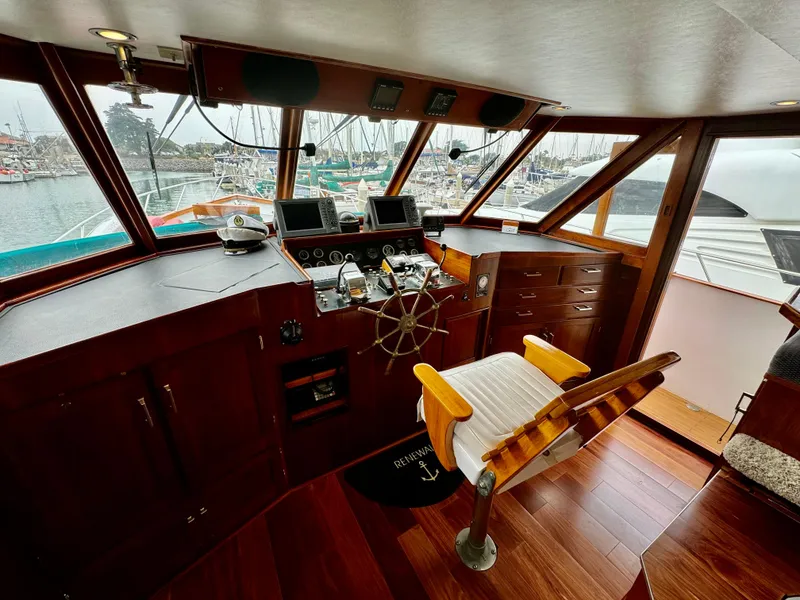 Slide: The Image of Helm of 1976 Nordlund 60 Motoryacht with wooden interior and navigation equipment. - 27