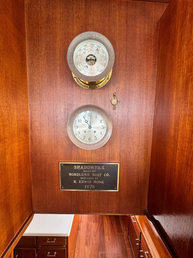 Slide: The Image of Wooden interior of 1976 Nordlund 60 Motoryacht with clock and barometer. - 34