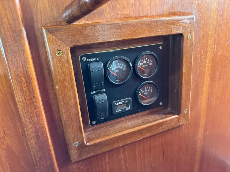 Slide: The Image of Control panel on 1976 Nordlund 60 Motoryacht with gauges and switches. - 37