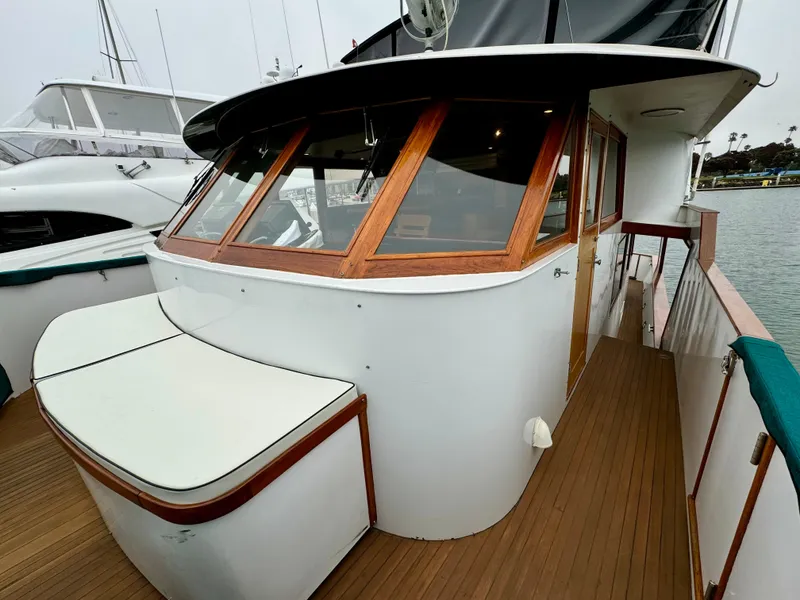 Slide: The Image of 1976 Nordlund 60 Motoryacht with wooden accents and spacious deck area. - 39