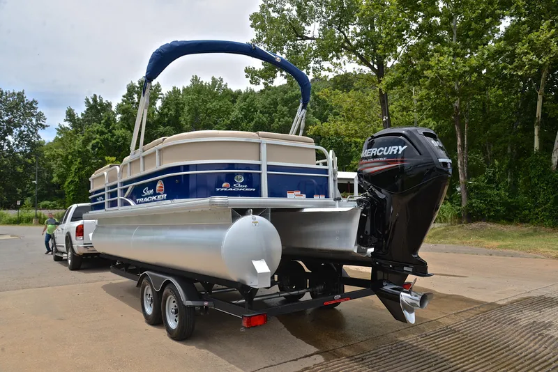 Slide: The Image of 2018 Sun Tracker Party Barge 20 DLX pontoon boat on trailer with Mercury outboard motor. - 12