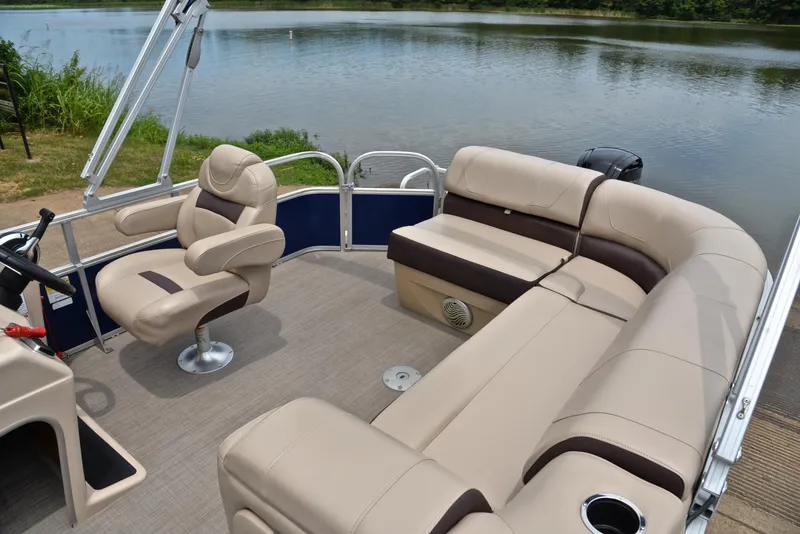 Slide: The Image of 2018 Sun Tracker Party Barge 20 DLX pontoon boat interior with beige seating. - 22