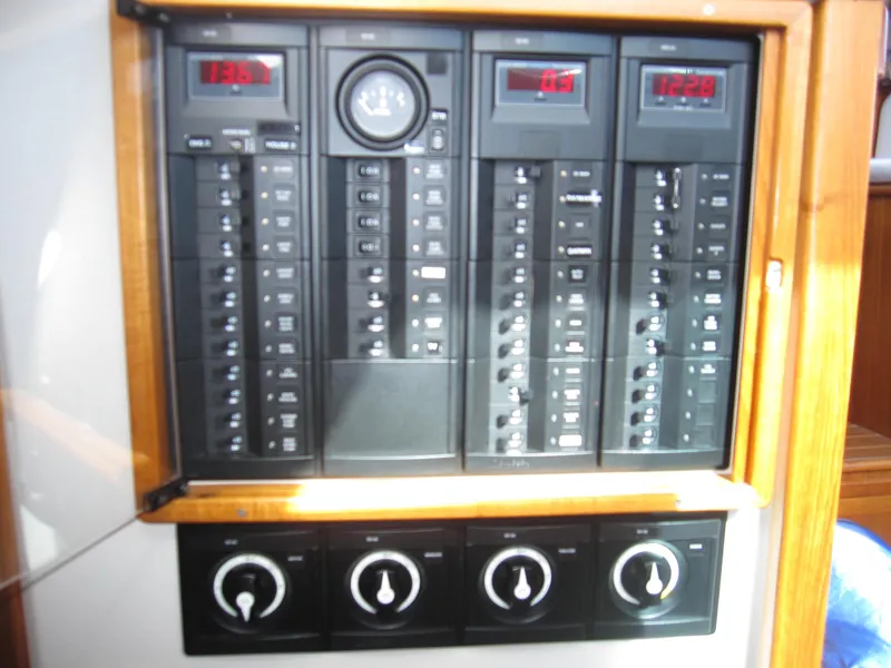 Slide: The Image of Electrical control panel of a 1990 Blue Seas 31 Hardtop Cruiser boat. - 23