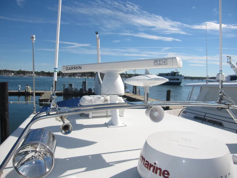 Slide: The Image of Close-up of 1990 Blue Seas 31 Hardtop Cruiser with Garmin radar system. - 38