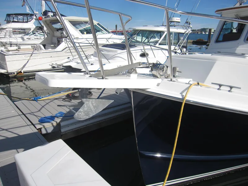 Slide: The Image of 1990 Blue Seas 31 Hardtop Cruiser docked at marina - 42