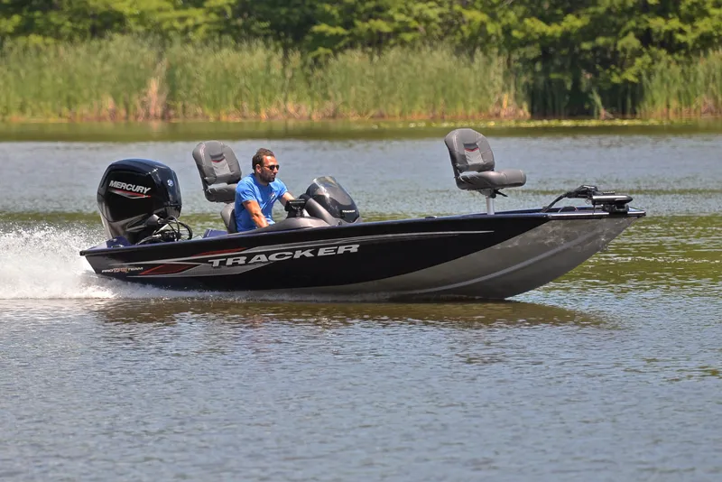 The Image of 2021 Bass Tracker PRO TEAM 175 TF boat on a lake. - 1