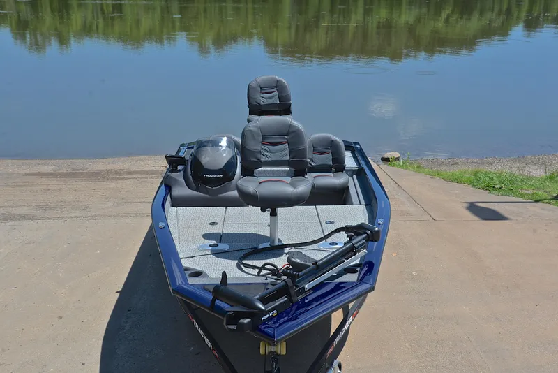 Slide: The Image of 2021 Bass Tracker PRO TEAM 175 TF fishing boat at a lakeside ramp. - 17