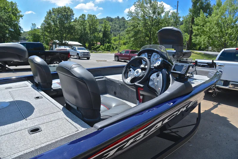 Slide: The Image of 2021 Bass Tracker PRO TEAM 175 TF boat interior with steering console and seating. - 19
