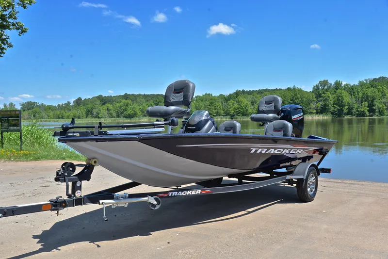 Slide: The Image of 2021 Bass Tracker PRO TEAM 175 TF fishing boat on trailer by a lake. - 10