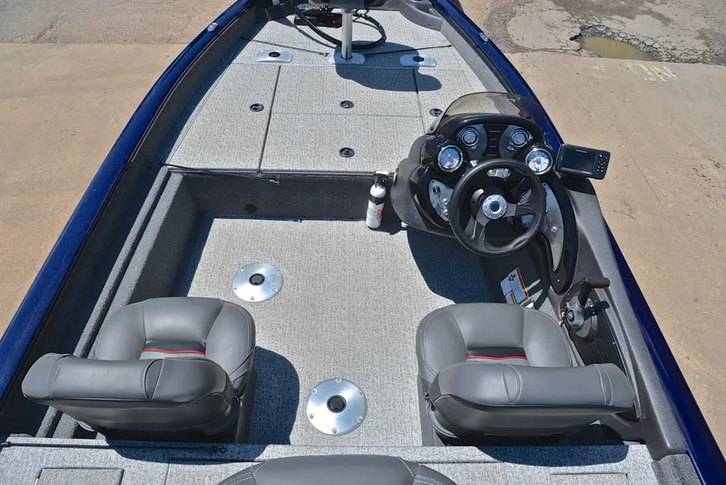 Slide: The Image of 2021 Bass Tracker PRO TEAM 175 TF boat interior with steering console and seating. - 20